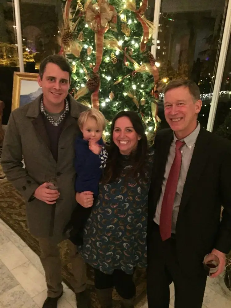 Val and her family with Governor Hickenlooper at a holiday party